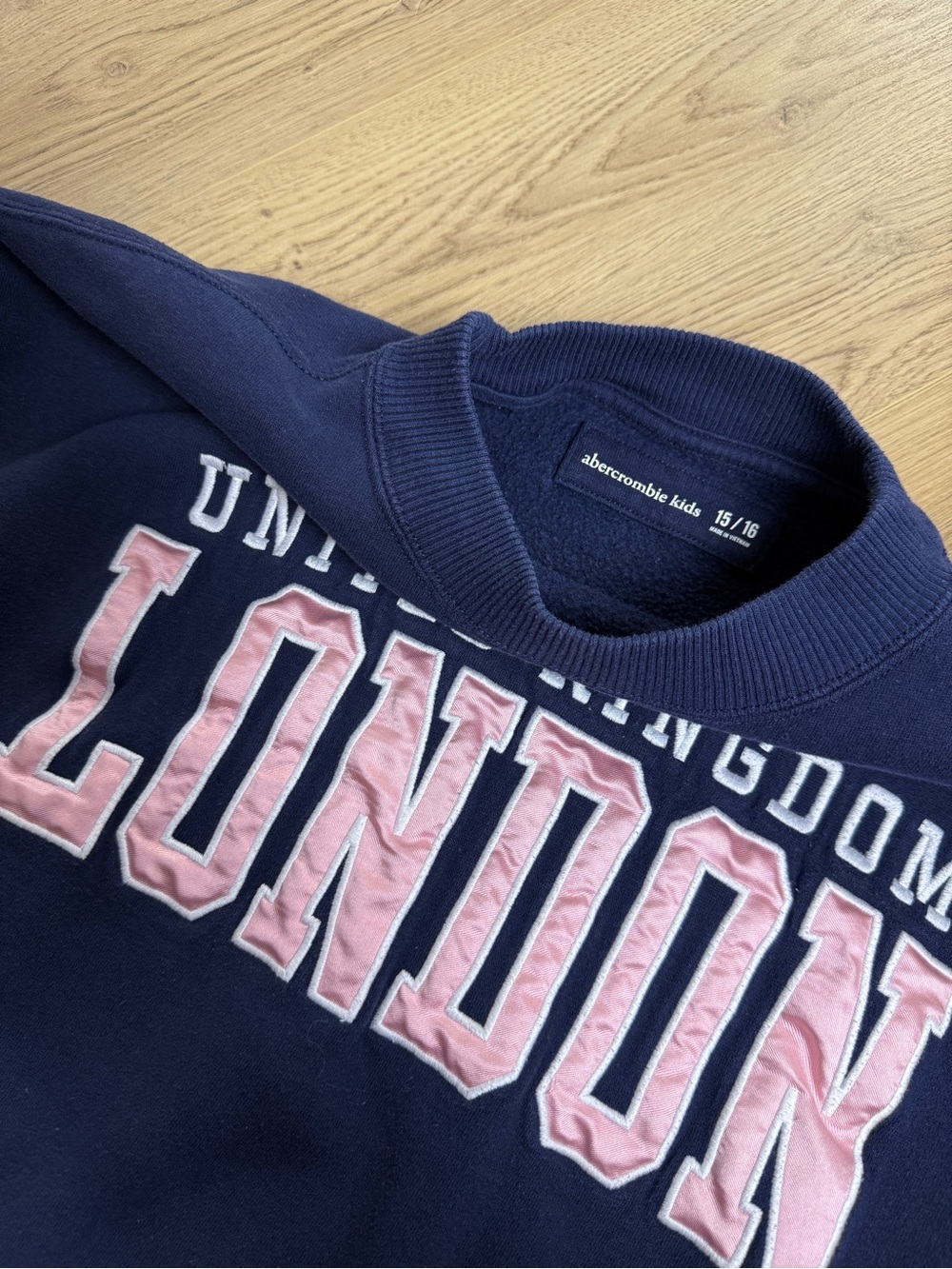 Abercrombie & Fitch Navy Crewneck Sweatshirt with Pink 'LONDON' Applique